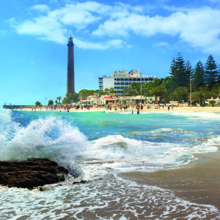 Seascape with lighthouse and Maspalomas beach. Gran Canaria, Canary Islands, Spain